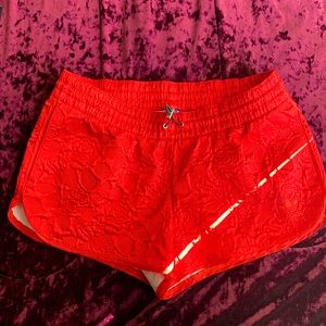 Adidas red embroidered flower shorts, size L